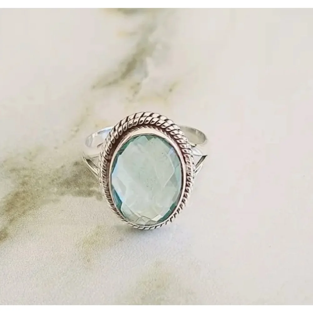 Oval Ocean Blue Zircon Silver Ring
